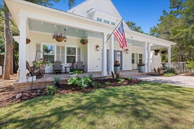 This coastal custom home is set on a protected bayou with serene - photo 2
