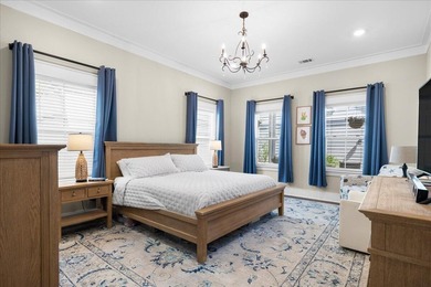 This coastal custom home is set on a protected bayou with serene - photo 8