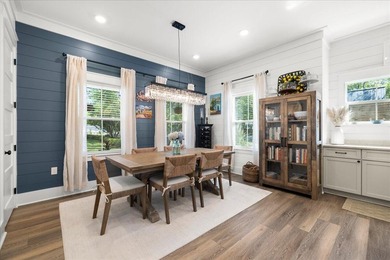 This coastal custom home is set on a protected bayou with serene - photo 9