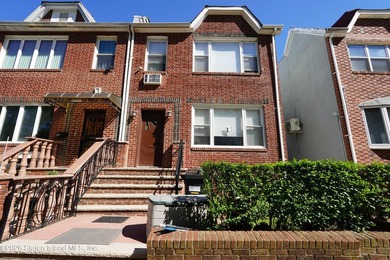 Welcome to 87 Bay 7 St-Beautiful all brick two family home - photo 1
