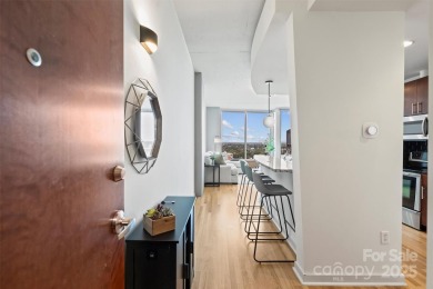 Welcome to elevated city living in this high-rise, luxury condo