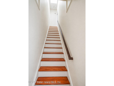 Welcome to 87 Bay 7 St-Beautiful all brick two family home - photo 4