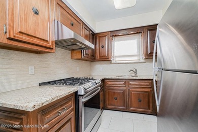 Welcome to 87 Bay 7 St-Beautiful all brick two family home - photo 5