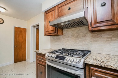 Welcome to 87 Bay 7 St-Beautiful all brick two family home - photo 6