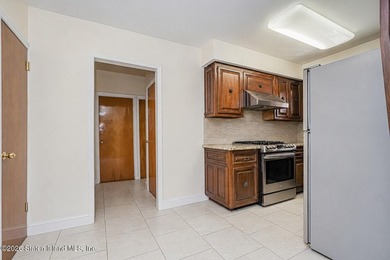 Welcome to 87 Bay 7 St-Beautiful all brick two family home - photo 7