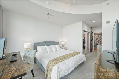 Welcome to elevated city living in this high-rise, luxury condo