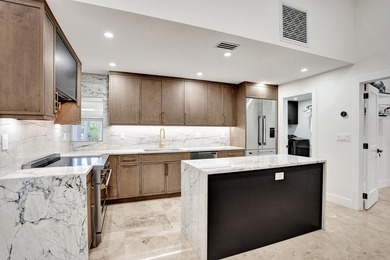 Welcome to one of Boca Raton's most sought-after gated golf - photo 36