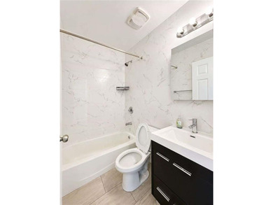 Discover the potential of this solid 6-family brick building - photo 7