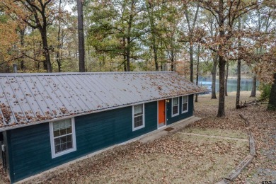 Charming 3-Bedroom, 2-Bath Lake Home with Stunning Views! This - Lake Home For Sale in Jefferson, Texas