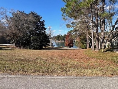 Almost 1 DEEDED acre with approximately 94' WATER FRONTAGE on - photo 2