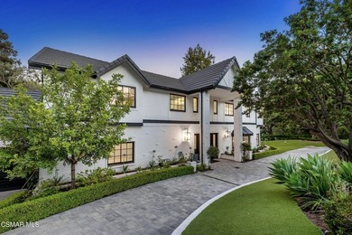 Situated along the prestigious North Ranch Golf Course, this - photo 2