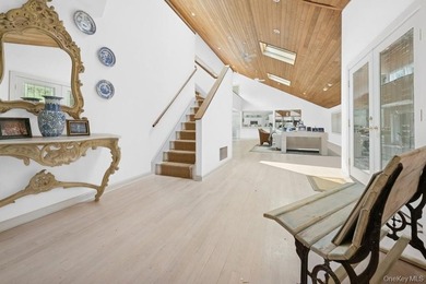 Tucked away on 1.4 acres of lush, landscaped grounds, this - photo 5
