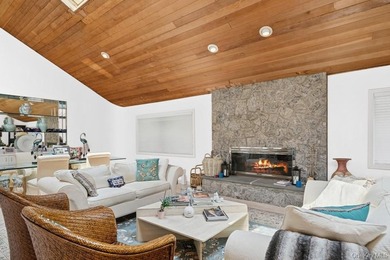 Tucked away on 1.4 acres of lush, landscaped grounds, this - photo 7