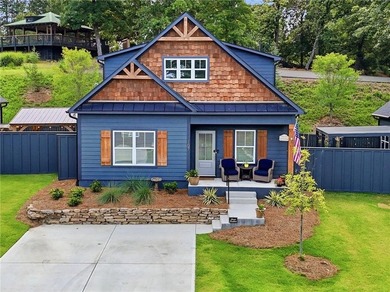 Sophistication meets the relaxed charm of lake living. This - photo 2