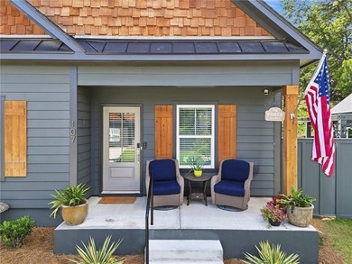 Sophistication meets the relaxed charm of lake living. This - photo 4