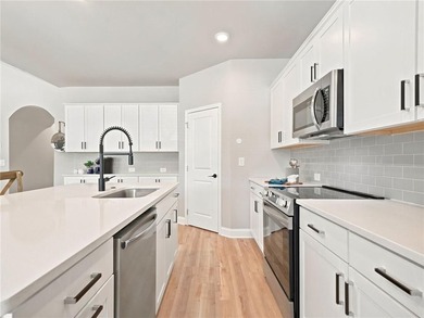 Sophistication meets the relaxed charm of lake living. This - photo 7