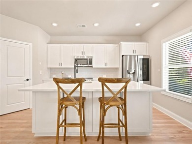 Sophistication meets the relaxed charm of lake living. This - photo 9