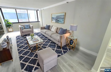 Beautifully Renovated Condo in the Prestigious World Plaza is