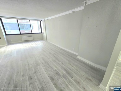 Beautifully Renovated Condo in the Prestigious World Plaza is