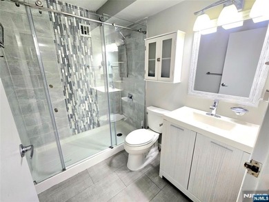 Beautifully Renovated Condo in the Prestigious World Plaza is