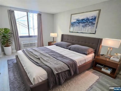 Beautifully Renovated Condo in the Prestigious World Plaza is