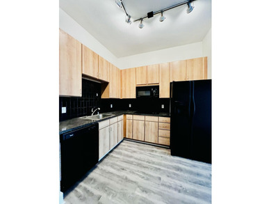A move-in ready, low-maintenance 1-bedroom, 1-bath unit in the