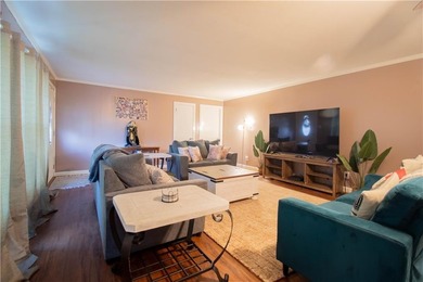 PRICE REDUCED! Welcome to this inviting 3-bedroom, 2-bath brick