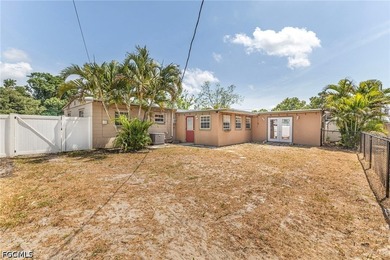 Welcome to this 4-bedroom, 2-bath home located in the Tropical - photo 11