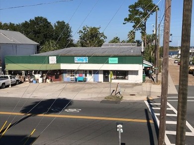 Four storefronts totalling approx 4600 sq ft, across street from - photo 3