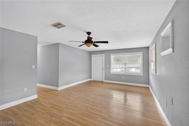 Welcome to this 4-bedroom, 2-bath home located in the Tropical - photo 17