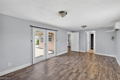 Welcome to this 4-bedroom, 2-bath home located in the Tropical - photo 22
