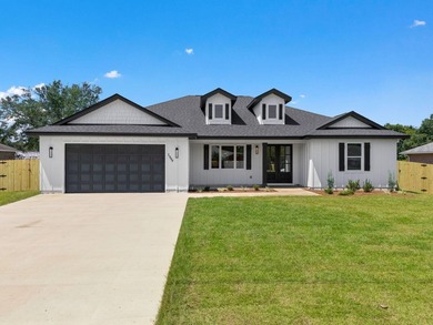 This remarkable new construction home by Carr Custom Homes is - photo 2