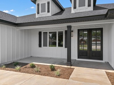 This remarkable new construction home by Carr Custom Homes is - photo 3
