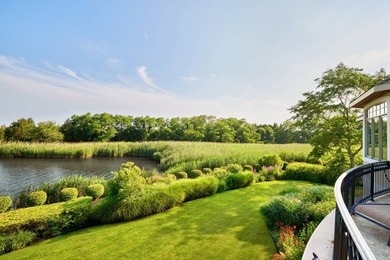 Wrapped in breathtaking views over Mecox Bay and the Atlantic - photo 8