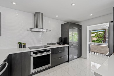 Enjoy sweeping golf course and lake views from this beautifully - photo 12
