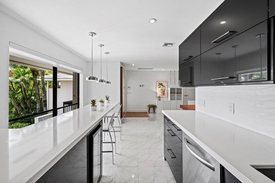 Enjoy sweeping golf course and lake views from this beautifully - photo 13