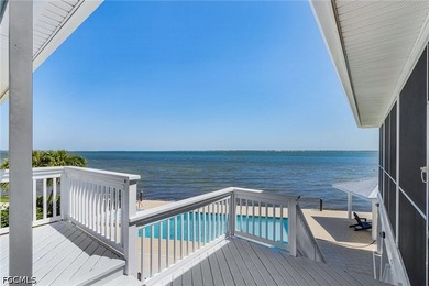 Welcome to a rare direct Gulf access waterfront estate in the - photo 21