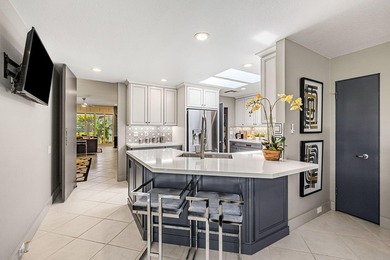 This stunning Hollywood Regency-inspired home inside the gates - photo 25