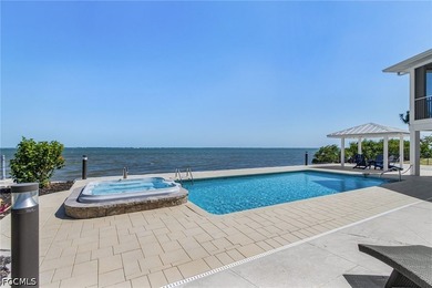Welcome to a rare direct Gulf access waterfront estate in the - photo 36