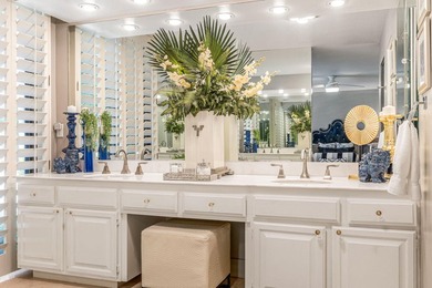 This stunning Hollywood Regency-inspired home inside the gates - photo 42