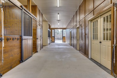 Exceptional 12.86-acre equestrian estate offers a serene haven - photo 54