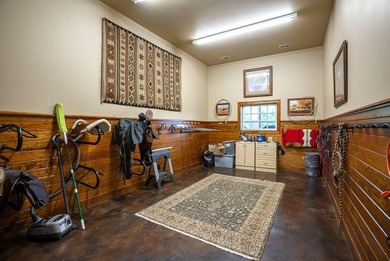 Exceptional 12.86-acre equestrian estate offers a serene haven - photo 58