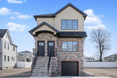 Brand-new 6 over 6 two-family home located in the desirable - photo 1