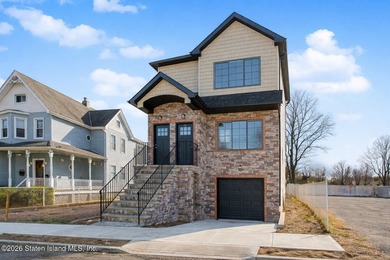 Brand-new 6 over 6 two-family home located in the desirable - photo 2