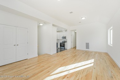 Brand-new 6 over 6 two-family home located in the desirable - photo 3