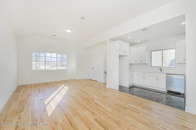 Brand-new 6 over 6 two-family home located in the desirable - photo 4