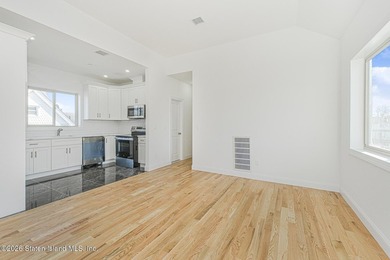Brand-new 6 over 6 two-family home located in the desirable - photo 6