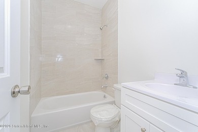 Brand-new 6 over 6 two-family home located in the desirable - photo 10