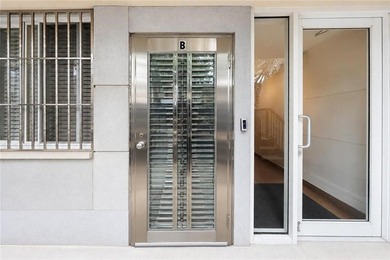 Welcome to this beautifully maintained first-floor condo in the - photo 4