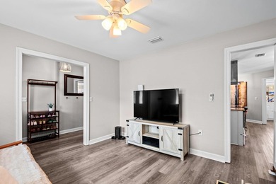 the main living spaces and bright tile finishes in the bathrooms - photo 6